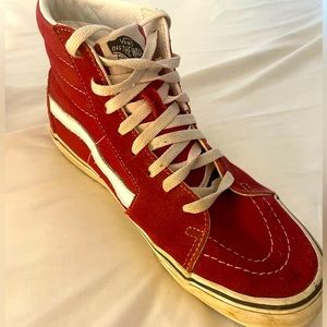 Cool maroon high top vans. Name brand.